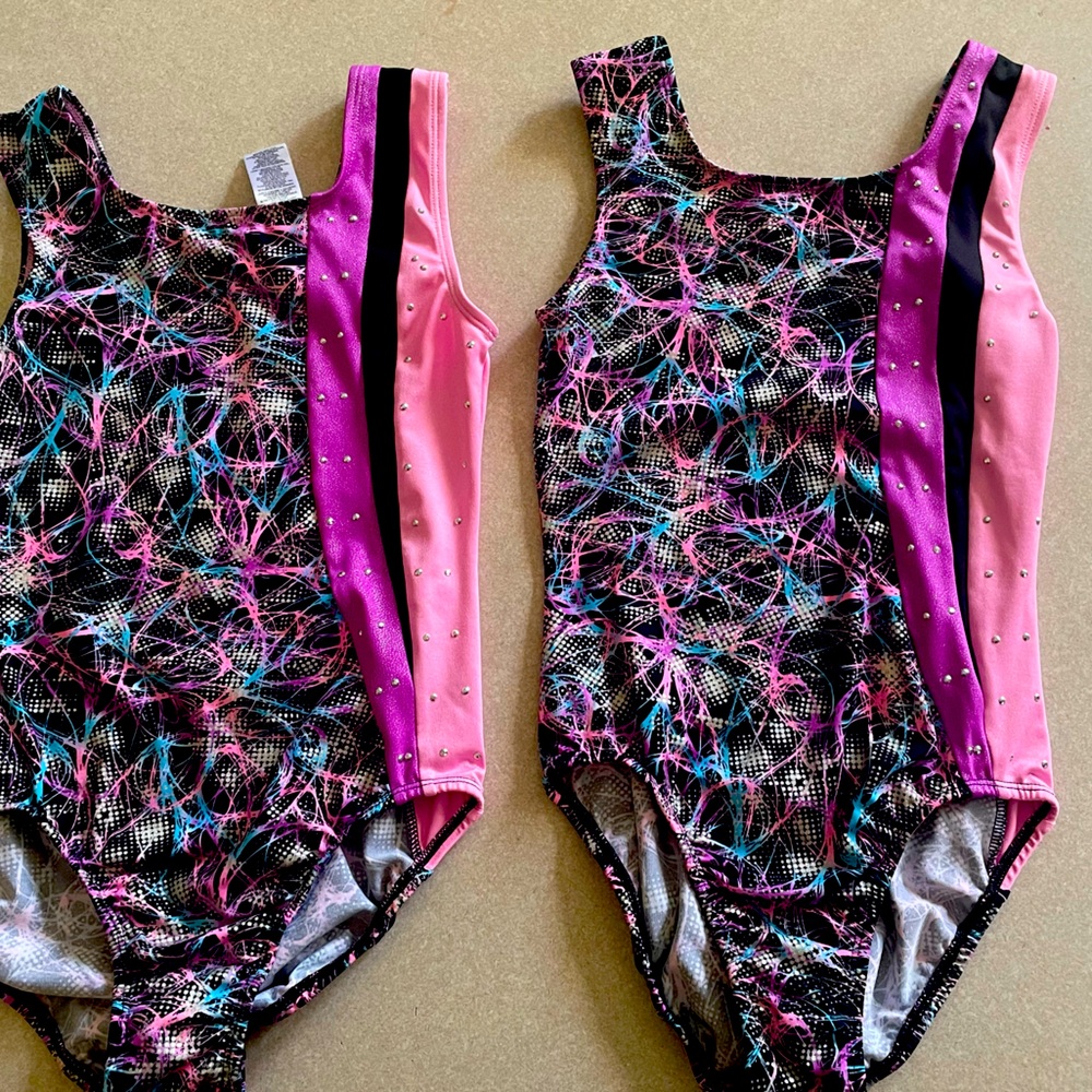 Moret girls gymnastics/dance leotards multi colored.